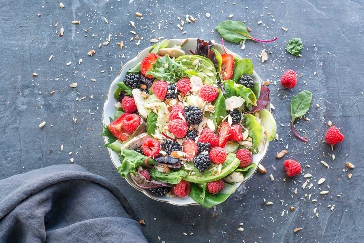 summer salad with chicken letuce veggies and mixed fruit