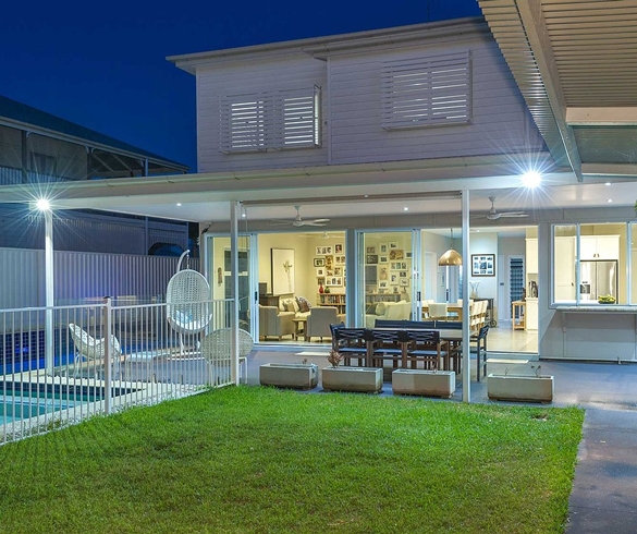 Exterior view of house with an outdoor living space. re?id=3438